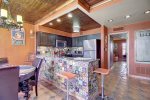 Talavera tile adds a lively texture to the kitchen